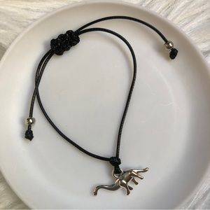 Dinosaur pendant string bracelet